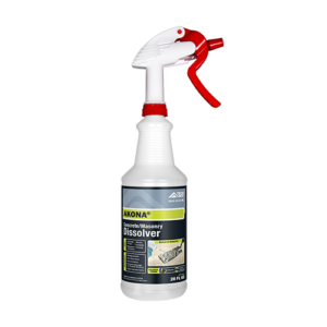 White spray bottle with red trigger labeled AKONA concrete/masonry dissolver, 28 fl oz, for cleaning concrete residues.