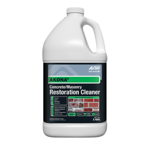 One-gallon white plastic bottle of Akona Concrete/Masonry Restoration Cleaner with a green label.