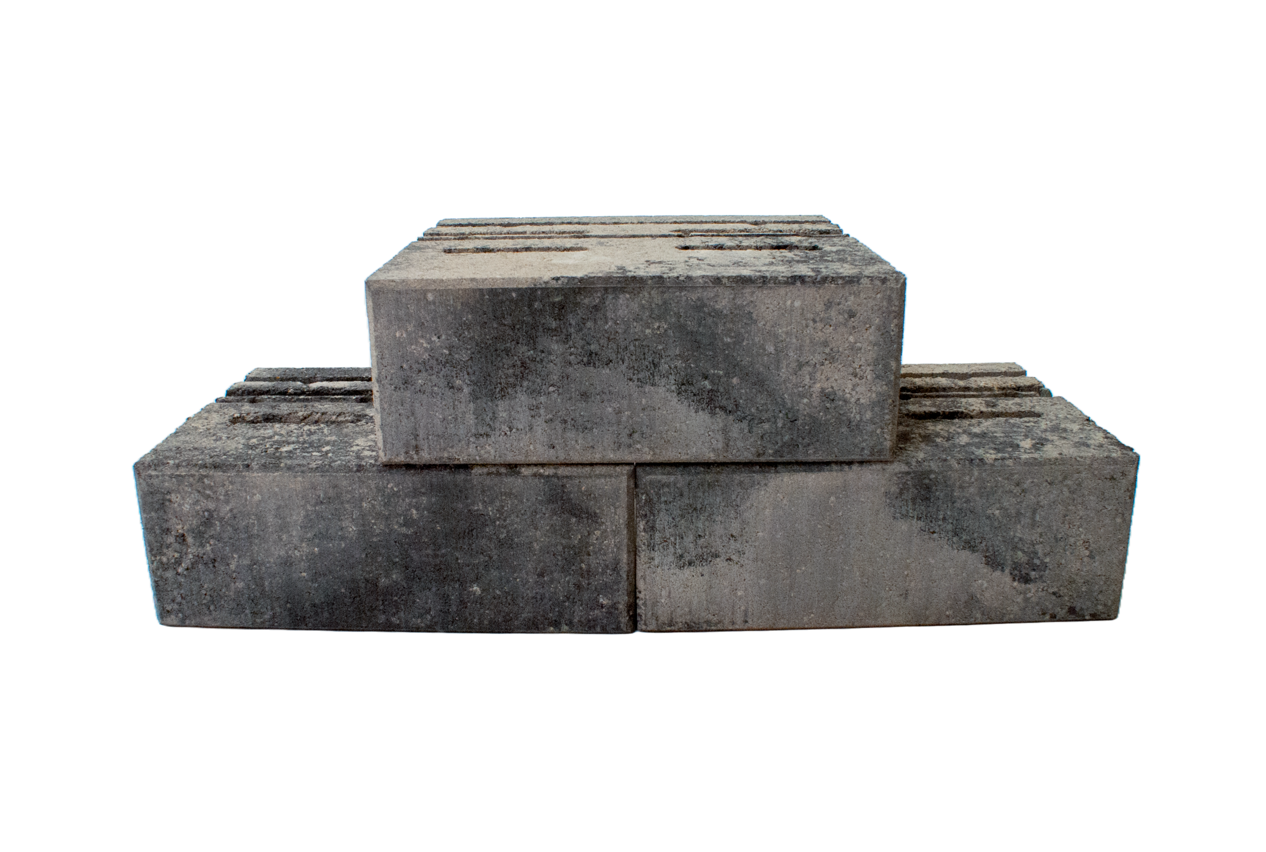 Stack of weathered gray concrete blocks on a dark background, viewed from above.